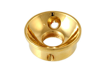 Gold-colored round metal jack plate with screw mounting holes and hollow center opening.