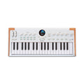 White electronic keyboard synthesizer with wood side panels, multiple knobs, buttons, and a small circular screen above the keys.