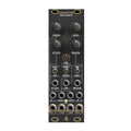 Black eurorack stereo compressor module with knobs, toggle switches, and multiple 3.5mm audio jacks.
