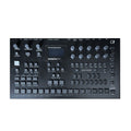 Top view of a black Elektron Analog Four MKII with knobs, buttons, and a small screen on the control panel.
