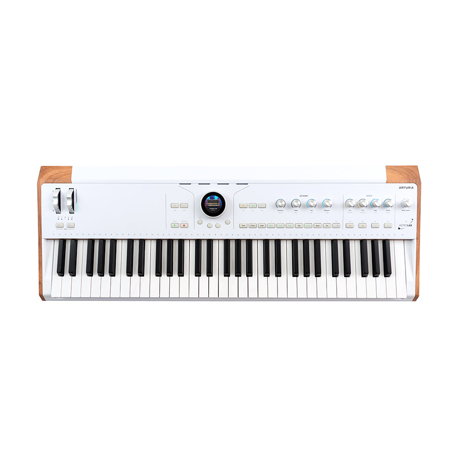 White keyboard synthesizer with wooden ends, pitch bend and modulation wheels, knobs, buttons, and a central circular display.