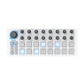 White music controller with 16 pads, 16 knobs, buttons, and blue LED lights.