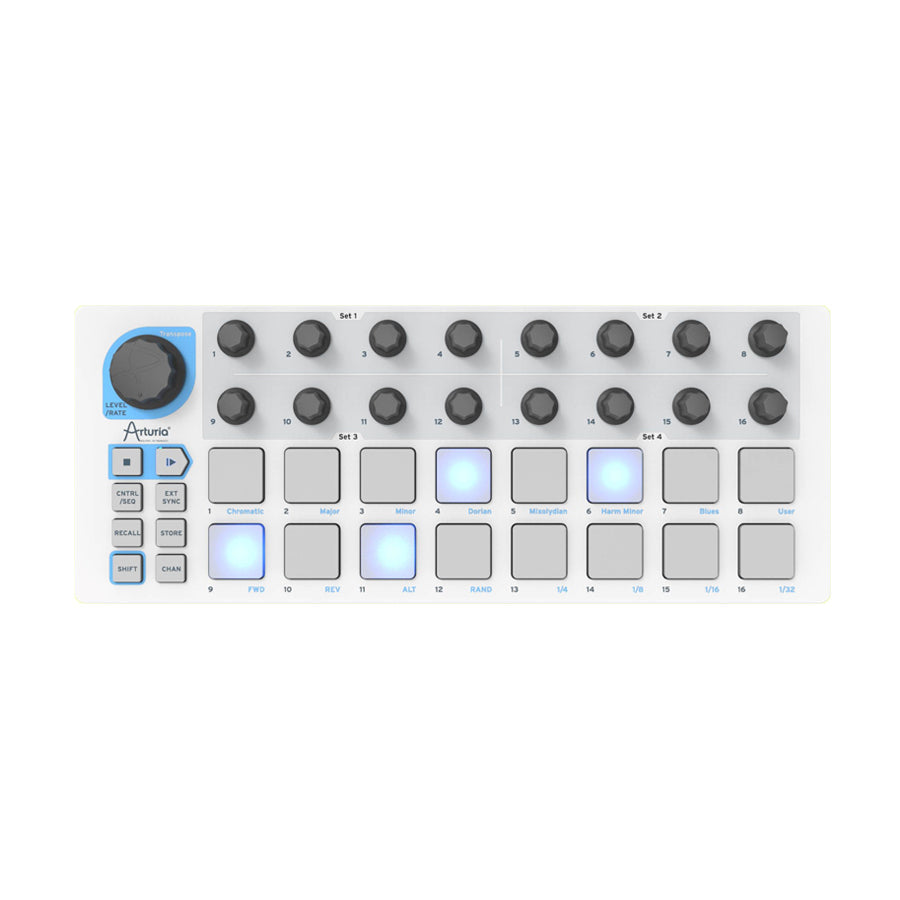 White music controller with 16 pads, 16 knobs, buttons, and blue LED lights.
