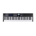 Black MIDI controller keyboard with 61 keys, pads, knobs, faders, and a small color screen on white background.