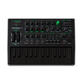 Black synthesizer keyboard with green details and multiple knobs, sliders, and two wheels, labeled Arturia Microbrute.