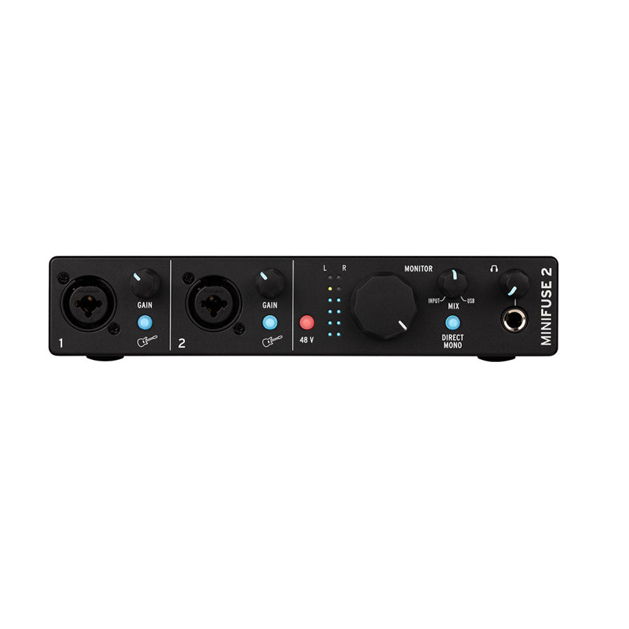 Front view of a black audio interface with two combo input jacks, gain knobs, monitor controls, and headphone jack.
