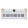 White slim-key stage keyboard with 37 keys, rotary knobs, buttons, and a central display showing a piano image.