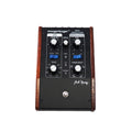 Black and wooden guitar effects pedal with knobs, switches, and 'moogerfooger ring modulator' text on top panel.