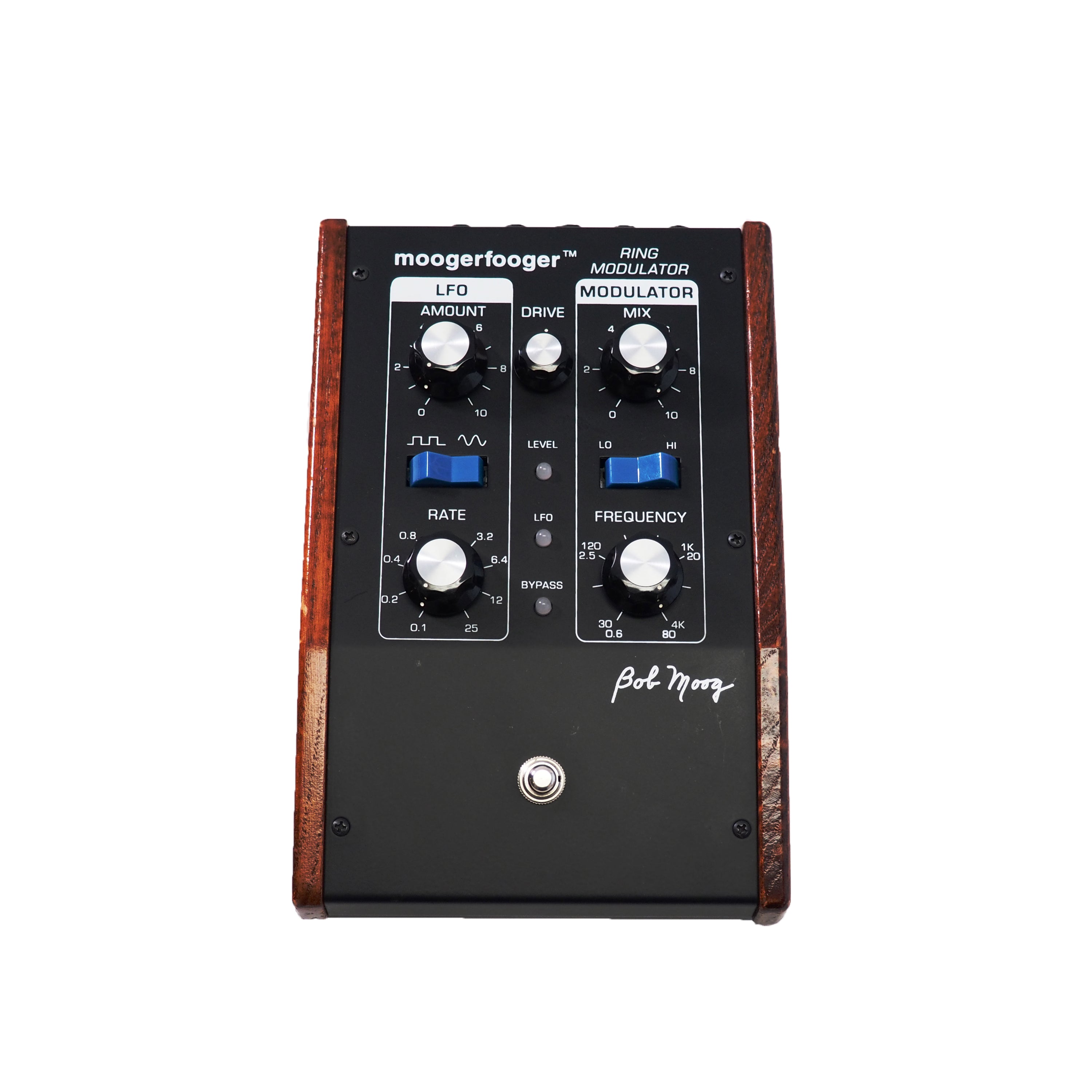 Black and wooden guitar effects pedal with knobs, switches, and 'moogerfooger ring modulator' text on top panel.