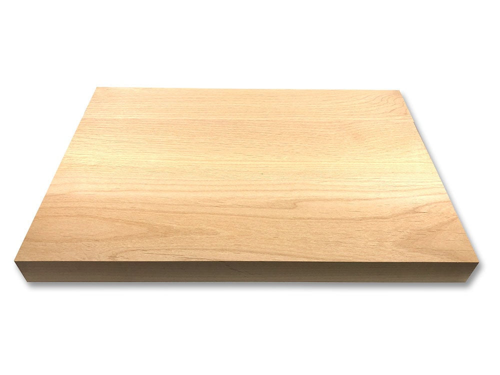 Photo of a smooth rectangular light brown wooden plank photographed on a white background.