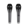 Front and rear views of two handheld black microphones with mesh heads and slide switch on one microphone.