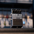 Black BOSS IR-2 Amp & Cabinet guitar effects pedal with knobs and multiple input/output jacks.