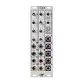 Silver Eurorack module with toggle switches and 3.5mm input and output jacks for eight channels.