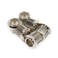 Six silver metal cylindrical bushings with ridged sides arranged on a white background.