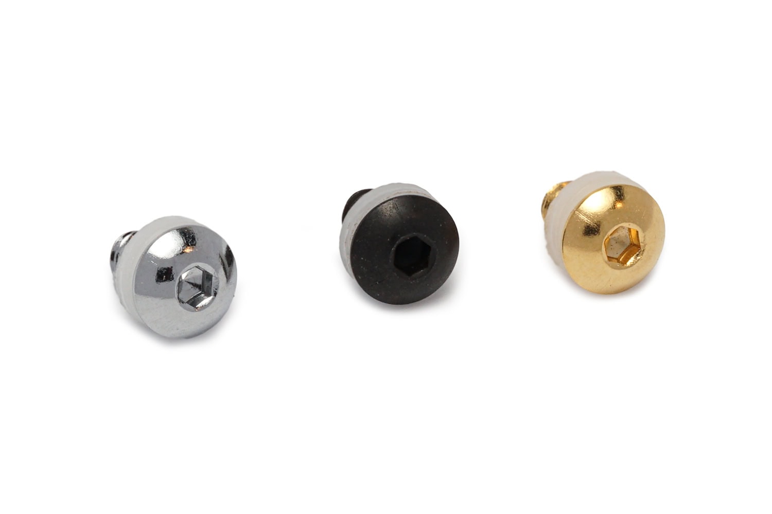 Three screws each with a plastic washer in silver, black, and gold finishes with hex socket heads.