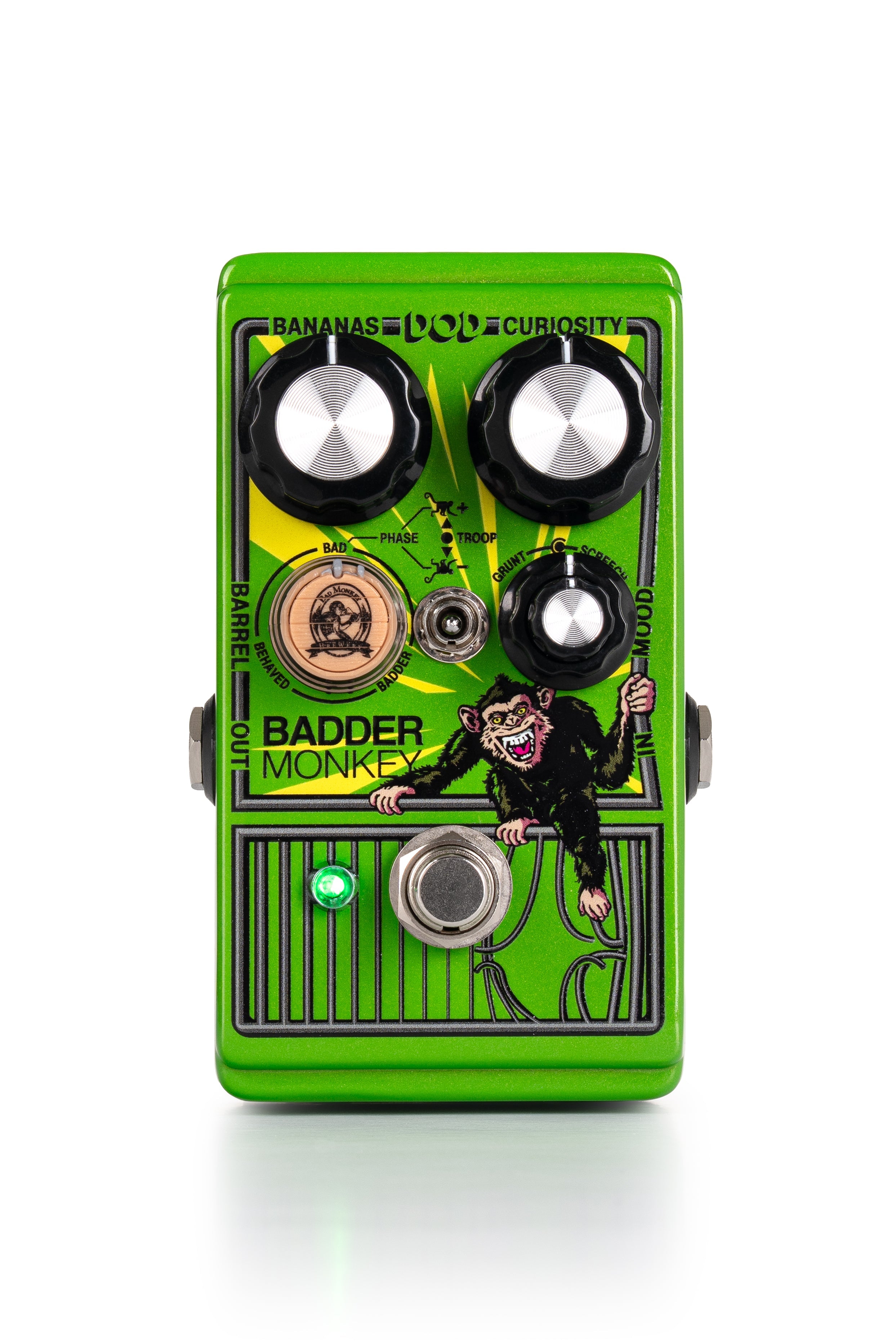 Green guitar effects pedal with monkey illustration, three knobs, a toggle switch, and a footswitch.
