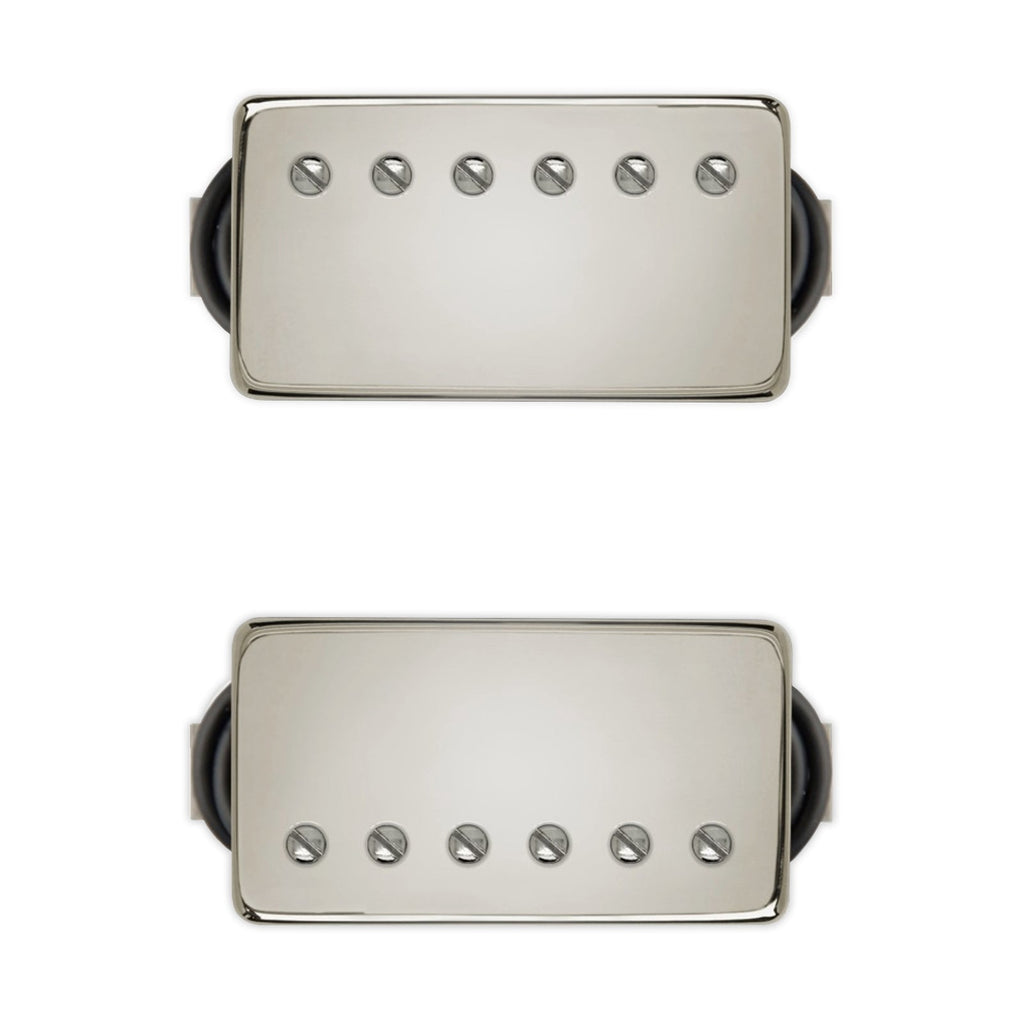 Two silver rectangular humbucker guitar pickups with black wires on a white background.