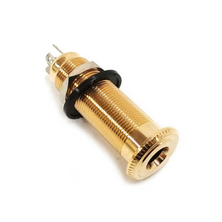 Gold-colored panel mount jack with black rubber washer and metal nut on white background.