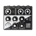 Top view of a black and white audio effects pedal with knobs and jacks labeled for spring reverb control.