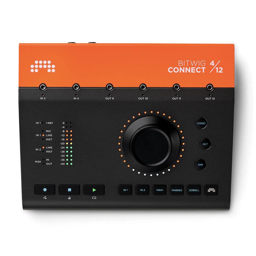 Top view of an orange and black audio interface with multiple jack ports, buttons, and a central large rotary knob.
