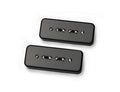 Two black rectangular guitar pickups with visible metal screws arranged in two rows each.