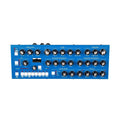 Blue synthesizer module with multiple knobs, push buttons, and labeled sections for oscillator, filter, amplifier, LFO, envelopes, voices mode, and effects.