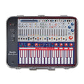 Top view of a Buchla Music Easel synthesizer with sliders, knobs, switches, jacks, and a keyboard interface panel.