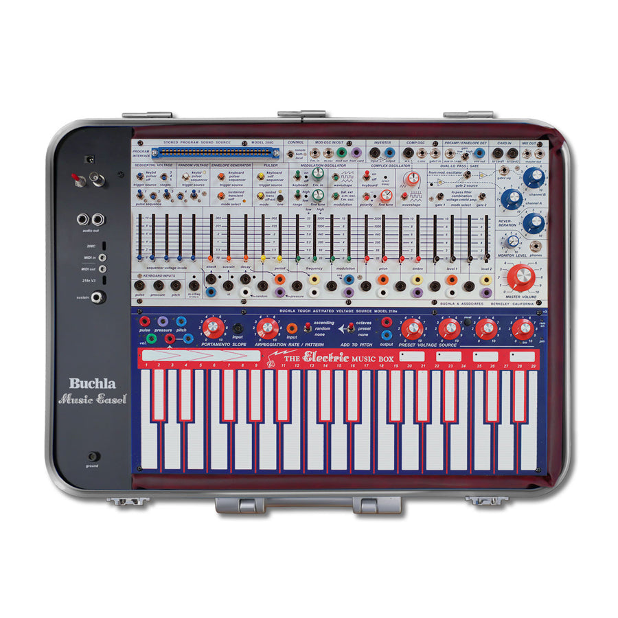 Top view of a Buchla Music Easel synthesizer with sliders, knobs, switches, jacks, and a keyboard interface panel.