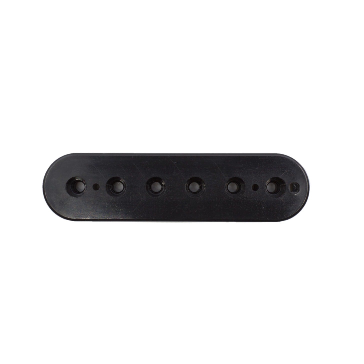 Black elongated plastic component with six circular holes and two small dots, front view on white background.