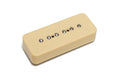 Cream-colored rectangular guitar pickup with six metal pole screws in two rows.