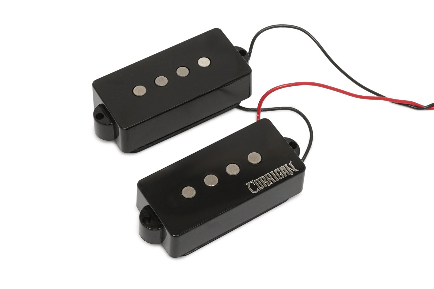 Two black electric bass pickups with four pole pieces and attached wires on a white background.