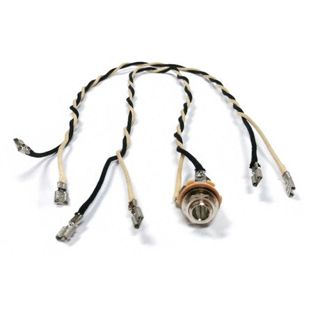 A wiring harness with twisted black and beige wires, crimp terminal connectors, and a mounted toggle switch.