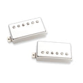 Two silver metal guitar pickups with six adjustment screws each on a white background.
