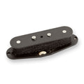 Black guitar pickup with three visible pole pieces and a white wire connected underneath.