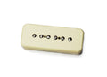 Cream-colored rectangular guitar pickup with six metal pole pieces and two black dots on the top.