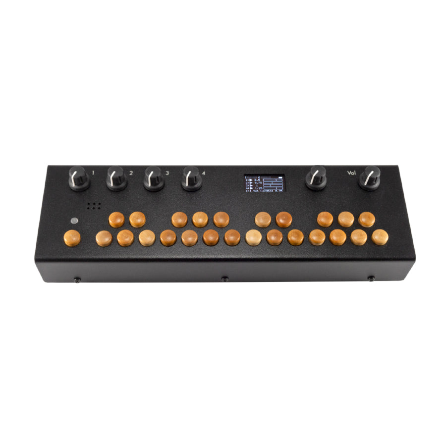 Black music device with wooden buttons, six rotary knobs, a small screen, and a speaker grille on top.