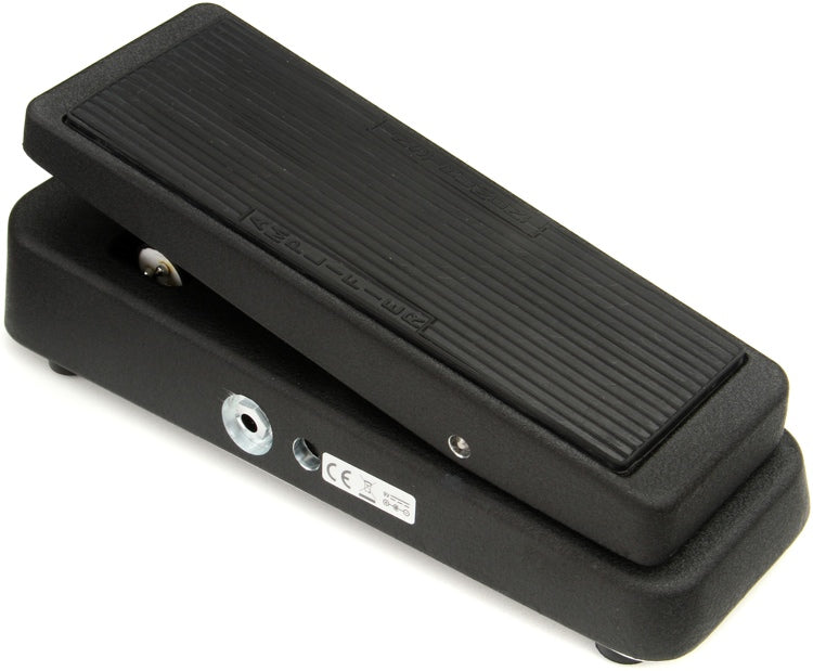 Black wah effect foot pedal with ribbed treadle and metal housing on a white background.