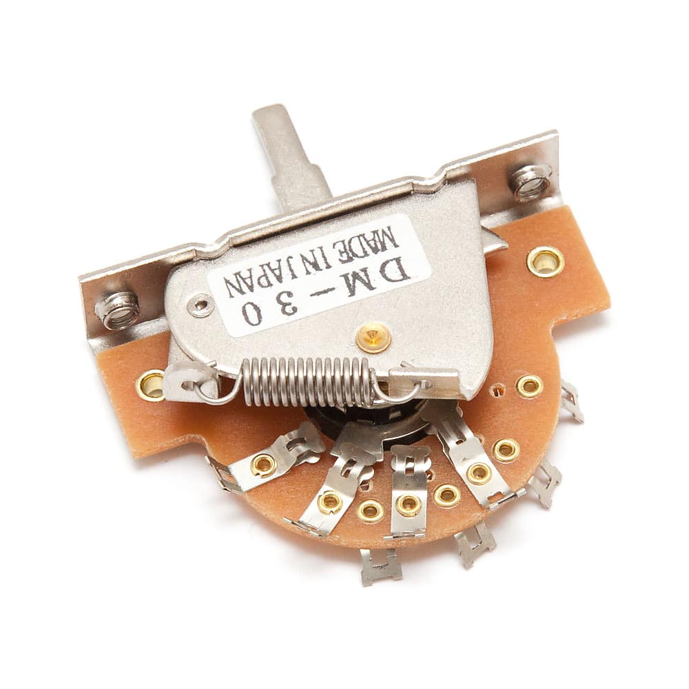 Close-up of a rotary 3-way selector switch with metal and circuit board parts and solder lugs.