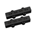 Two black rectangular electric bass guitar pickups with pole pieces and mounting holes.