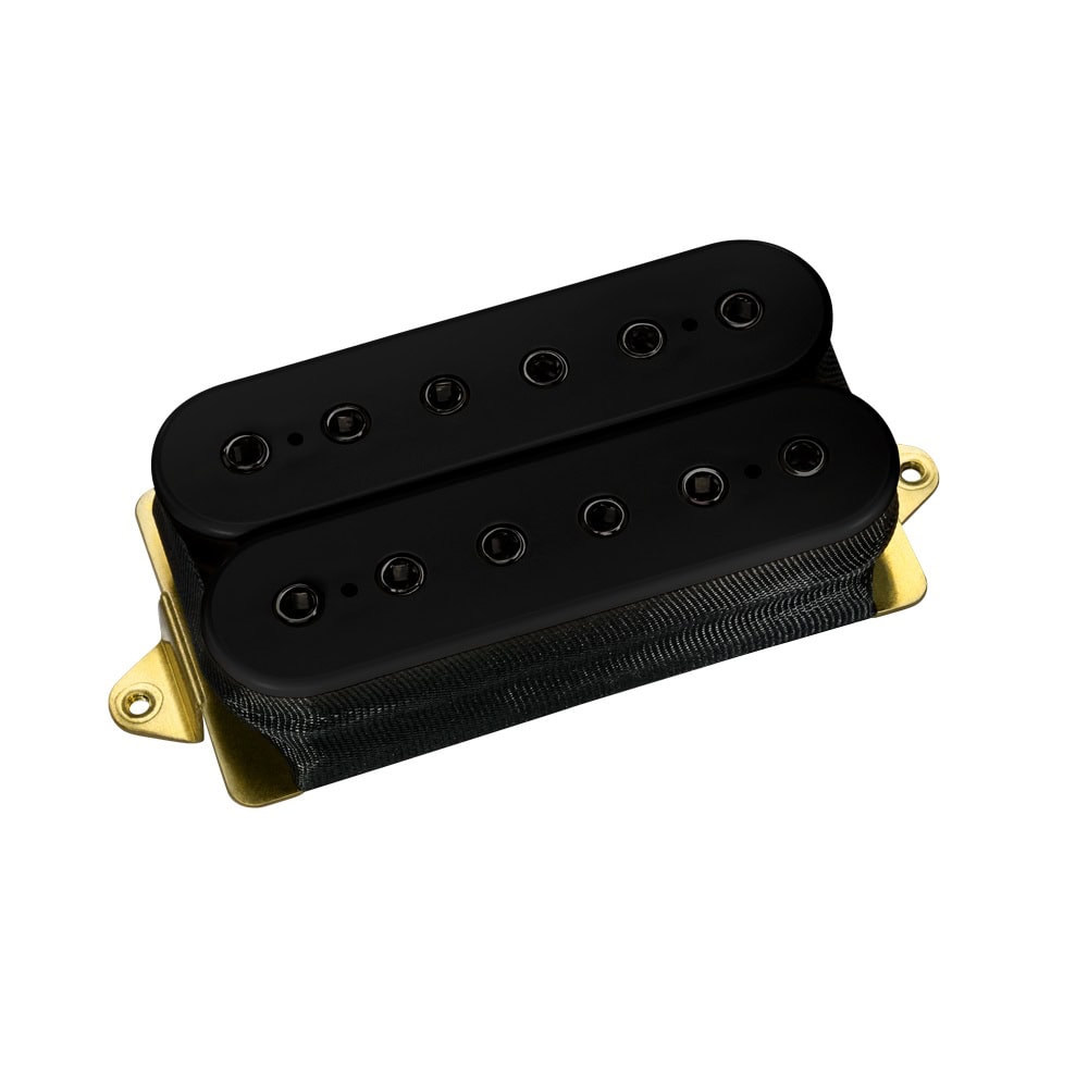 Black humbucker guitar pickup with gold base plate on white background.