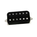 Close-up of a black guitar humbucker pickup with six adjustable pole screws on white background.