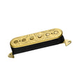 Ornate gold-colored guitar pickup with engraved floral pattern and black cloth wrapping.