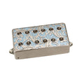 Metal guitar pickup with decorative engraved design and exposed pole pieces.