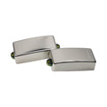 Two silver metal guitar pickups with green mounting bases shown on white background.