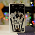 White guitar effects pedal labeled Pop Corner with three knobs, one toggle switch, and one footswitch.