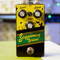 Black and yellow guitar effects pedal with three knobs and one footswitch labeled Saguenay Drive.