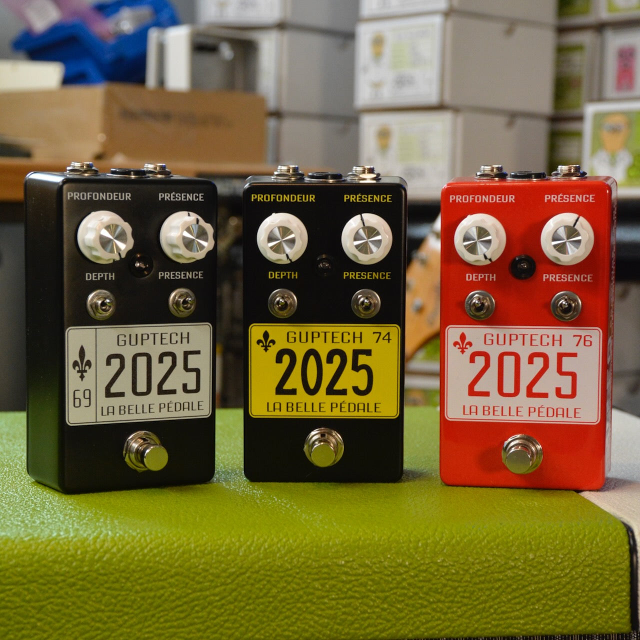 Three GUPtech guitar effect pedals with knobs, toggle switches, and footswitches in black, black with yellow label, and red colors.