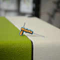 L-shaped hex key tool with blue and orange handle labeled Mr MojoFx resting on a green and white surface.