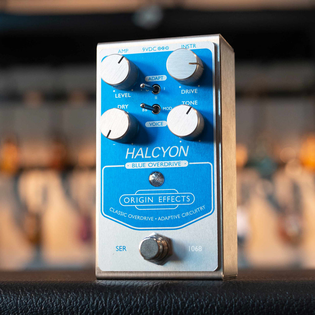 Blue and silver Origin Effects Halcyon Blue Overdrive guitar pedal with four knobs, two toggle switches, and one foot switch.