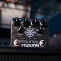 Black Analog Man King of Tone pedal with multiple knobs, two footswitches, and various input/output jacks.